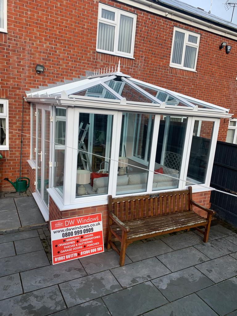 After DW white upvc conservatory