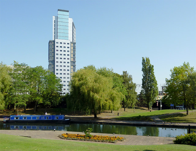 Victoria Hall building behind a park