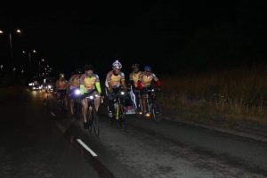 DW Windows cycling team in the dark