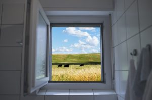 White upvc window open in bathroom