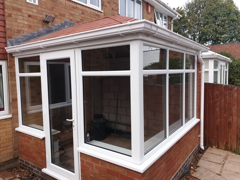 White uPVC Conservatory with tiled roof in a Wolverhampton home