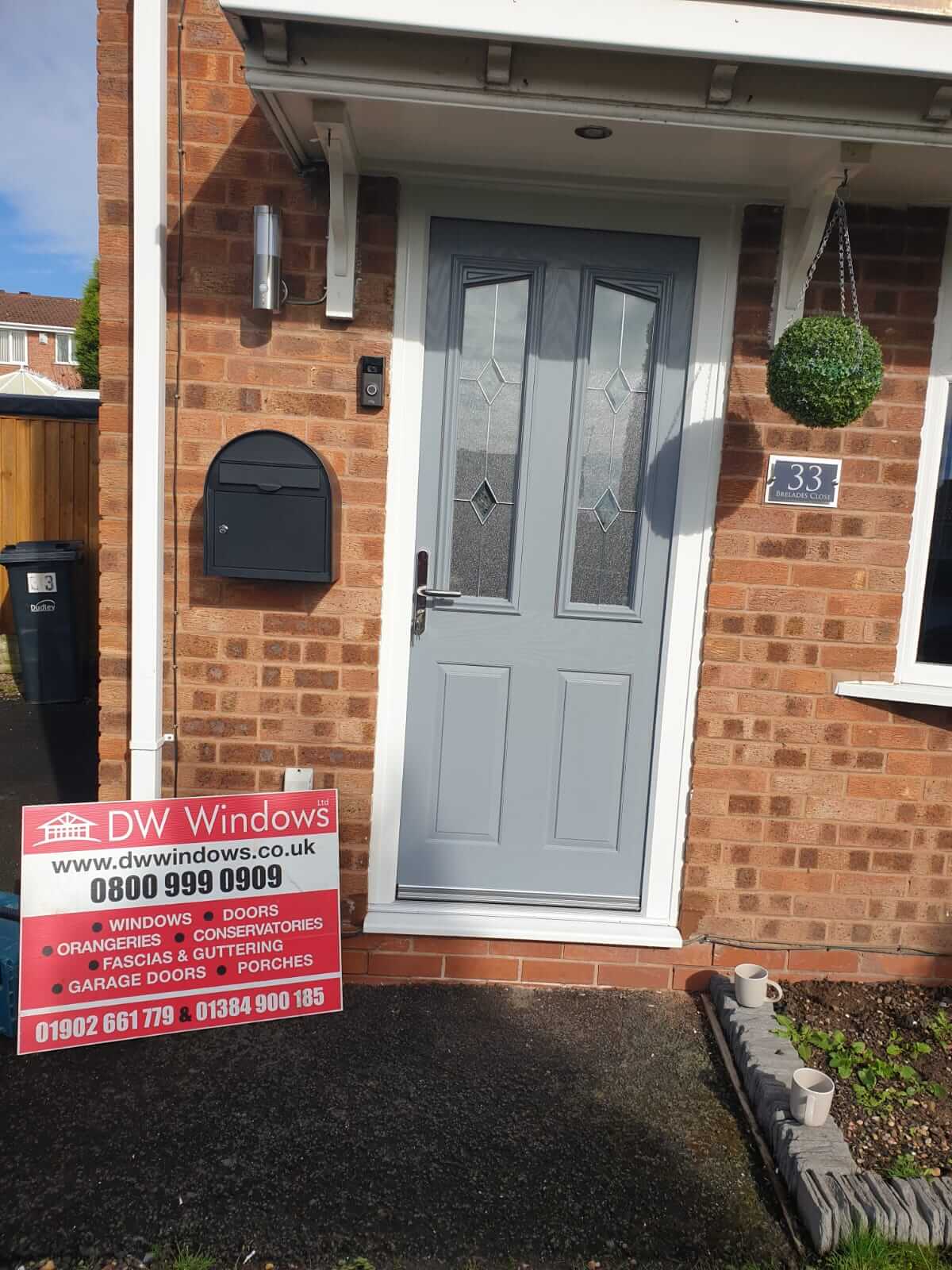 DW grey composite door installation
