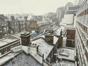 snowy building roofs