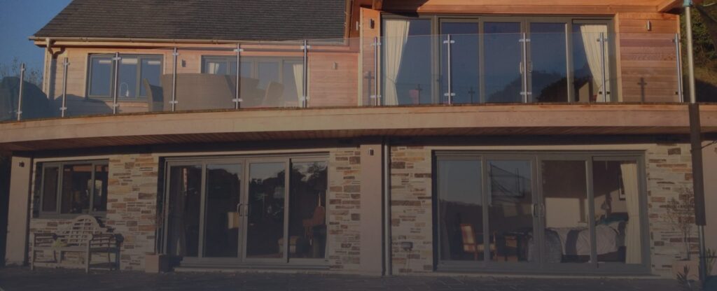 Brown upvc patio doors in sedgley front view of balcony with patio sliding doors