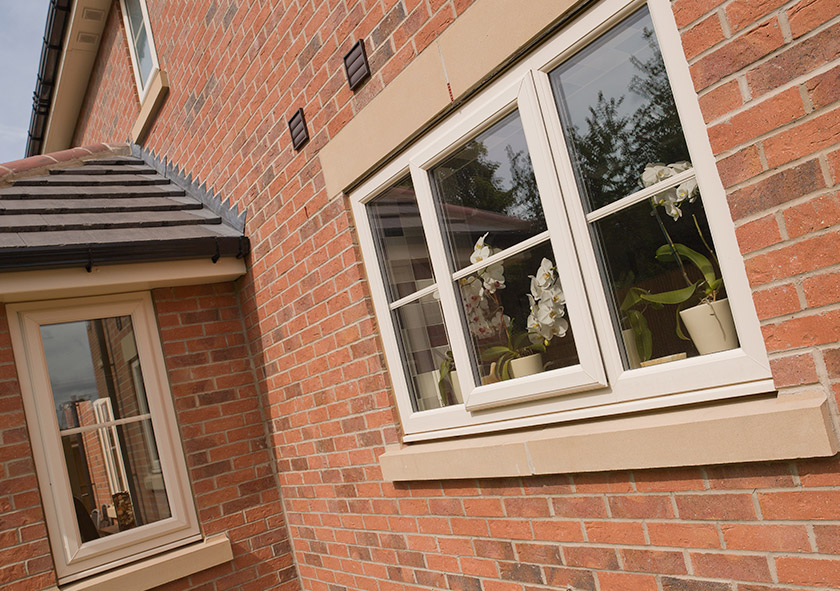 cream casement upvc windows in sedgley on a brick building